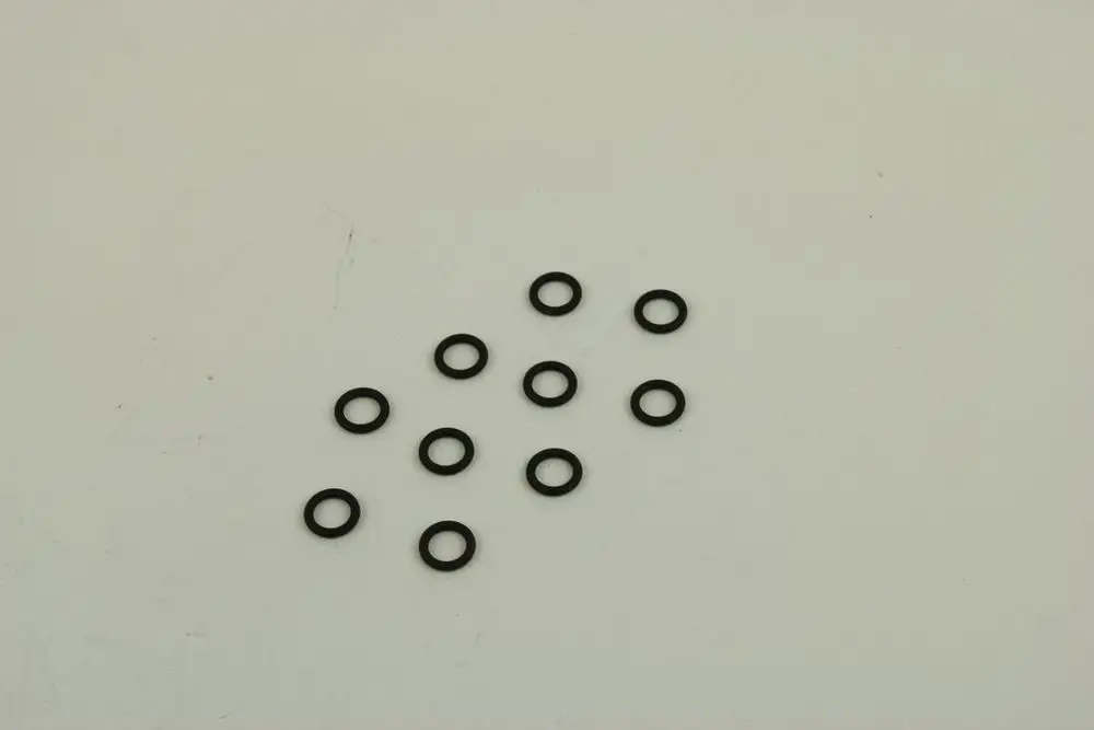 Schwarze O-Ringe in verschiedenen Anordnungen auf einem hellen Hintergrund, markiert mit der Marke Bosch.